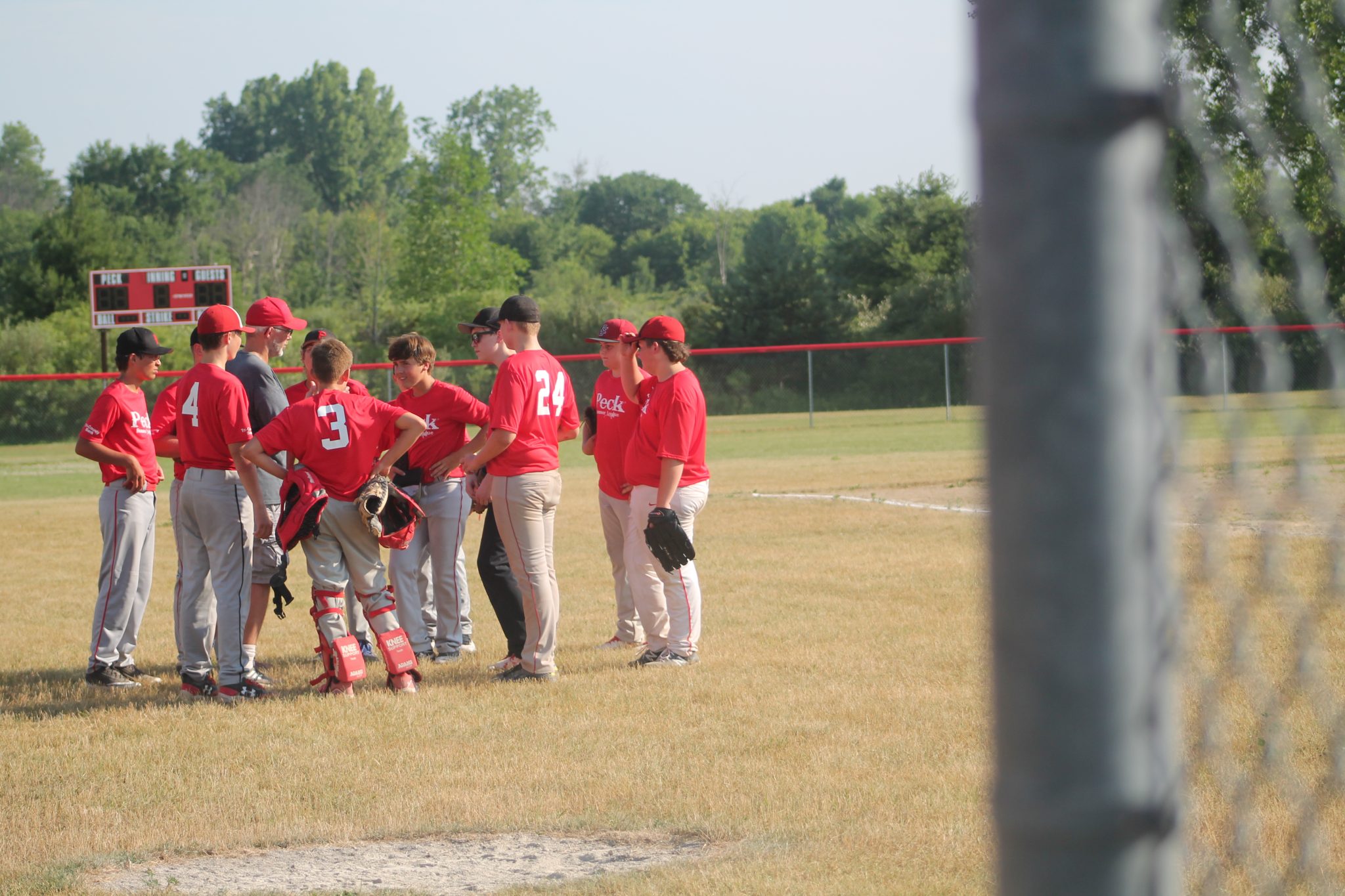Chris Babcock Is A Good Baseball Coach For The 14U Peck Pirates